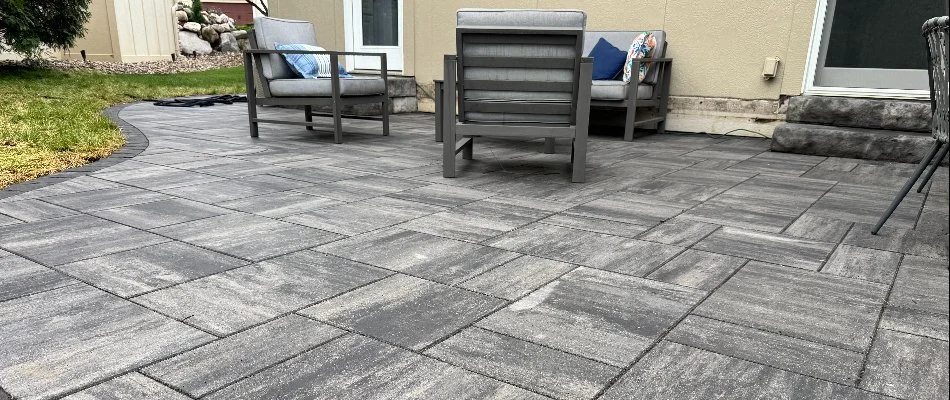 Paver patio with chairs in Waukee, IA.