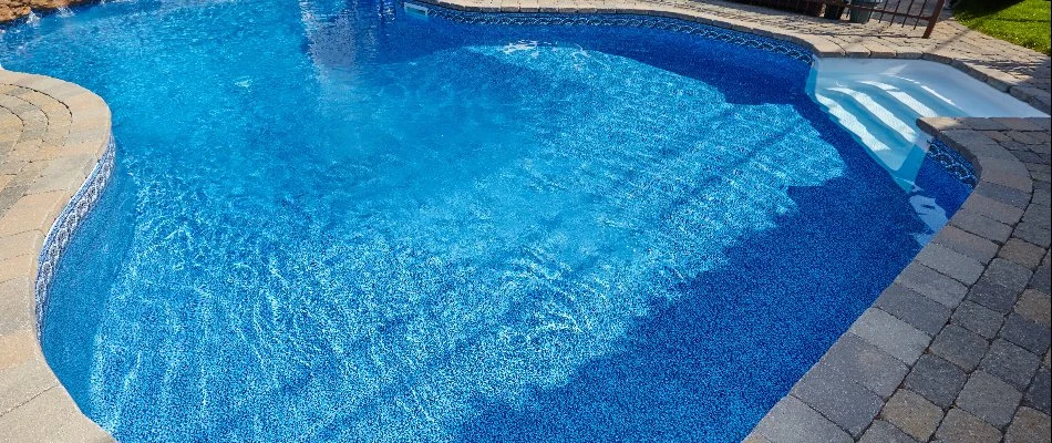 Pool in Waukee, IA, with integrated steps.