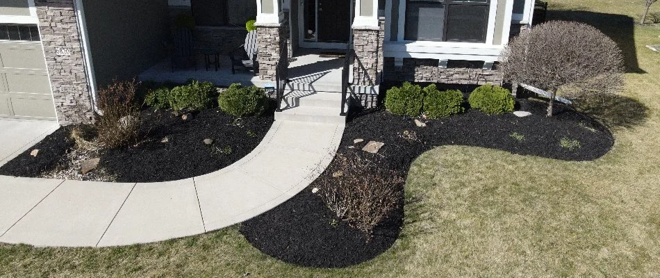 Pristine landscape with fresh mulch in Waukee, IA.