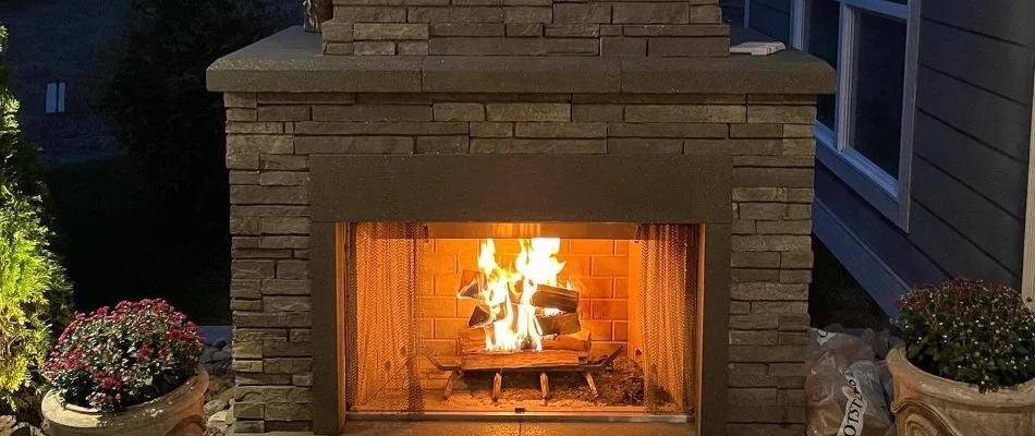 Wood-burning outdoor fireplace in Waukee, IA.