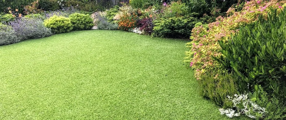 Artificial turf and lush plantings in Bondurant, IA.