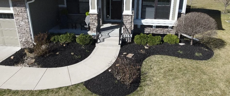 Black mulch in front of home in Rising Sun, IA