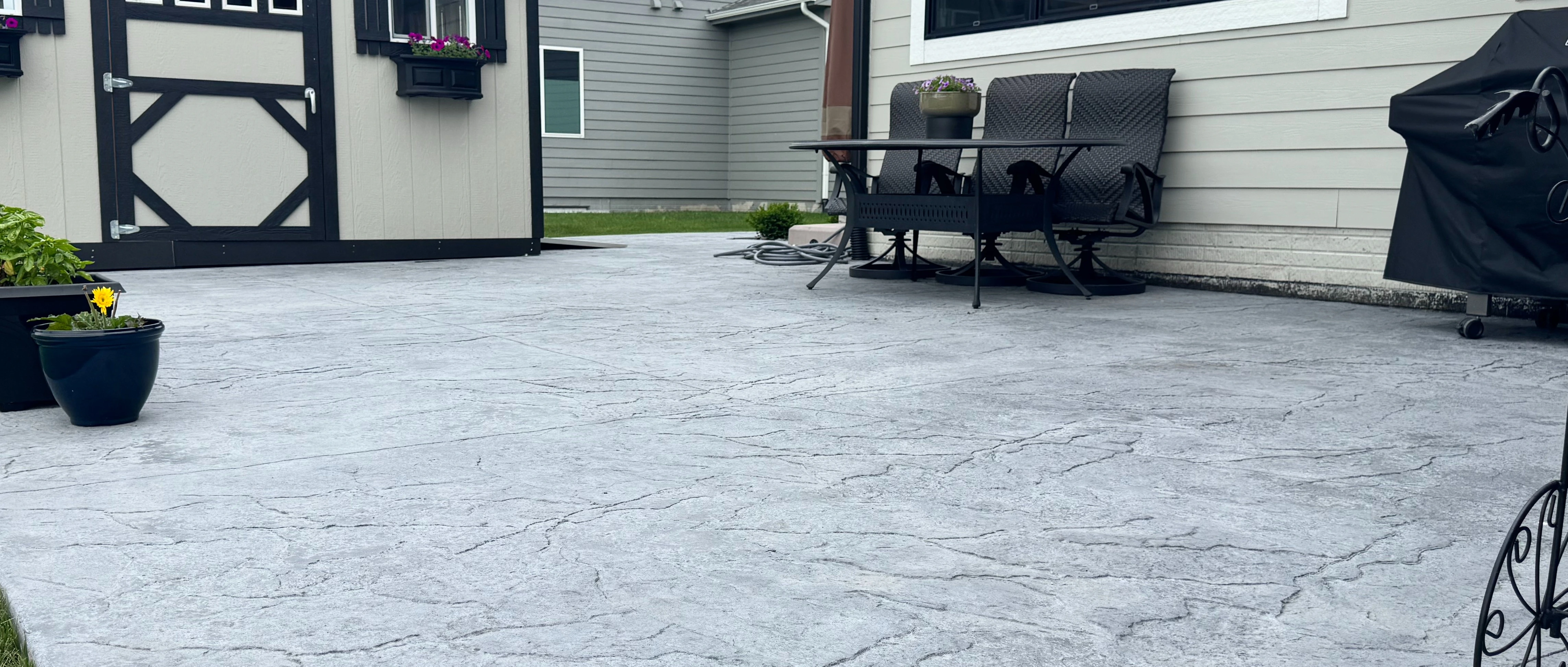 Concrete Patio Insallation infront of the house in Waukee, IA.