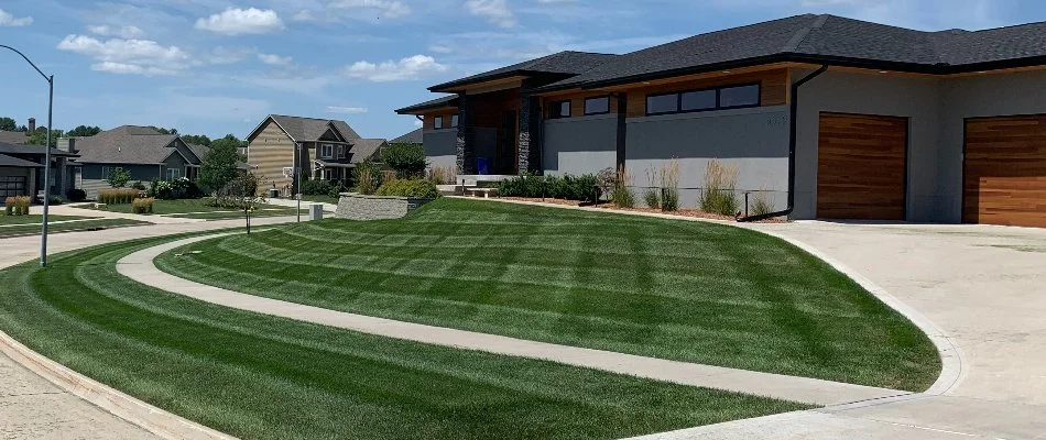 House with healthy mowed grass in Crocker, IA.