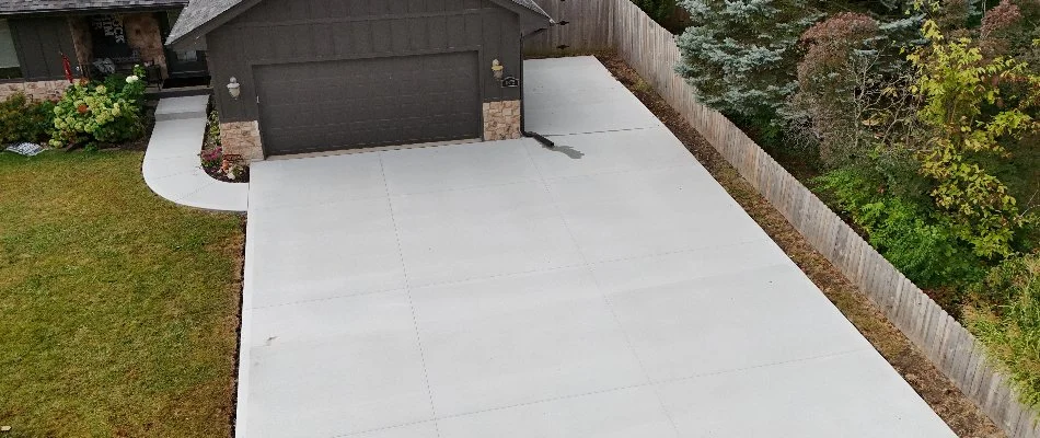 House in Crocker, IA, with a concrete driveway.