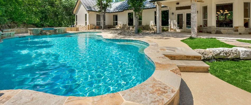 House in Waukee, IA, with a swimming pool.