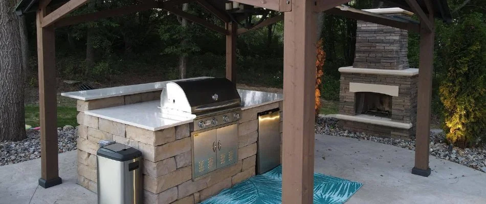 Outdoor kitchen and fireplace in Waukee, IA.