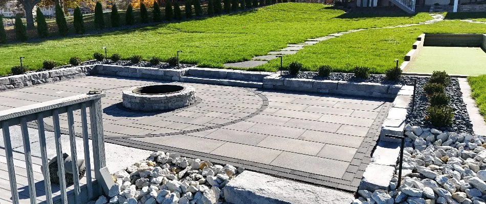 Patio and fire pit on a property in Fairmont Park, IA.