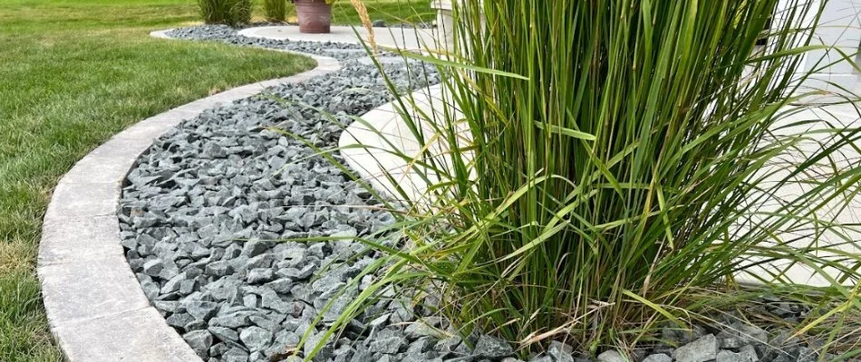 Rock ground cover in a landscape bed in Waukee, IA.