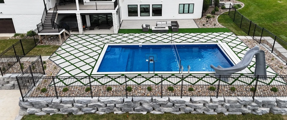 House in Waukee, IA, with a swimming pool.